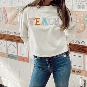 'TEACH' Pullover Sweatshirt - Cream with Pastel Letters